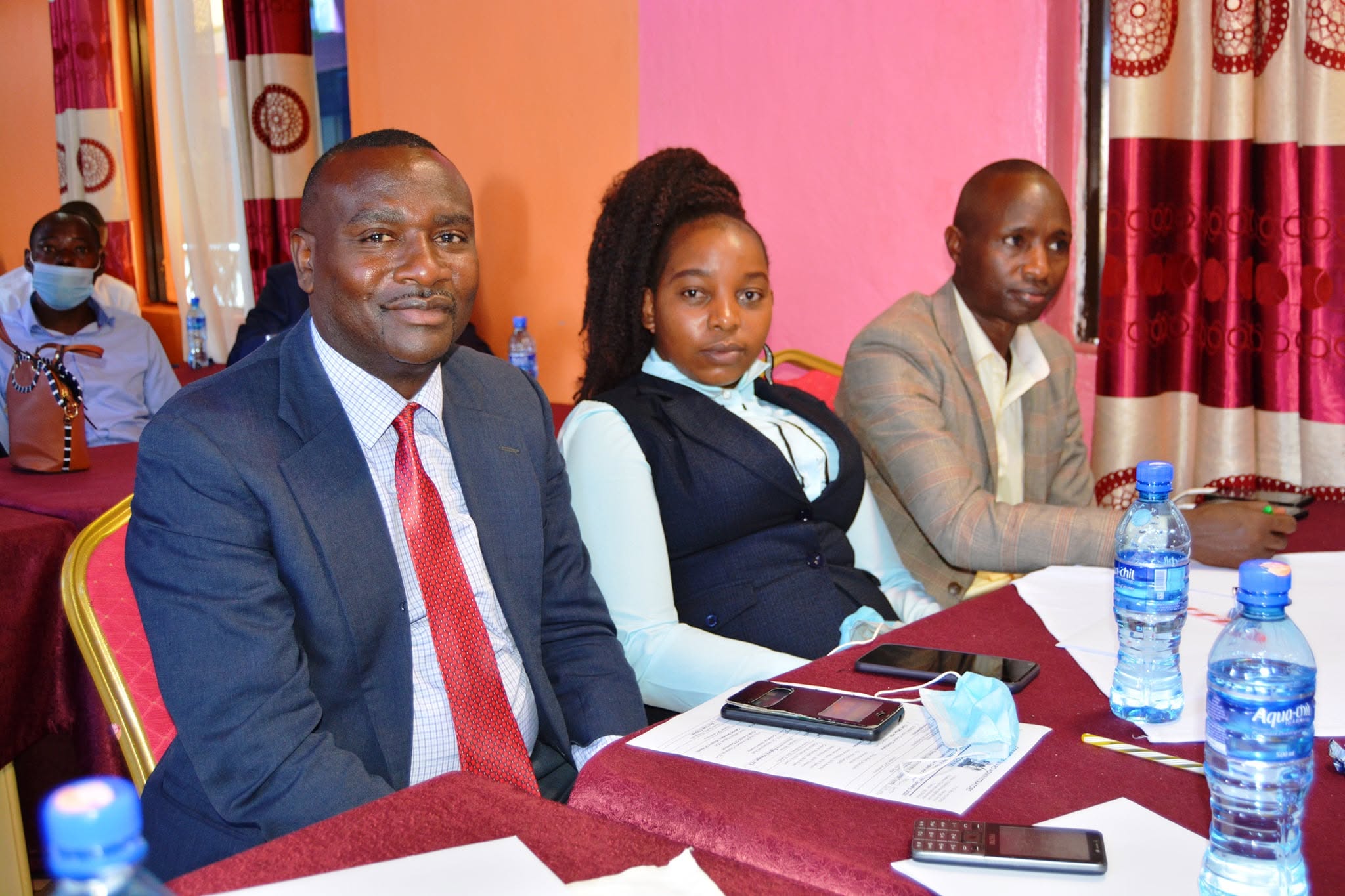 Conference participants at session